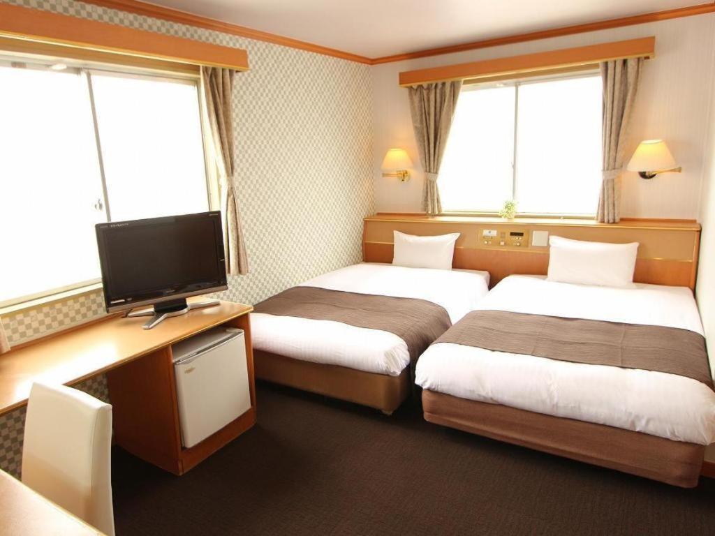 Hotel Livemax Budget Naha Tomarikou Exteriör bild