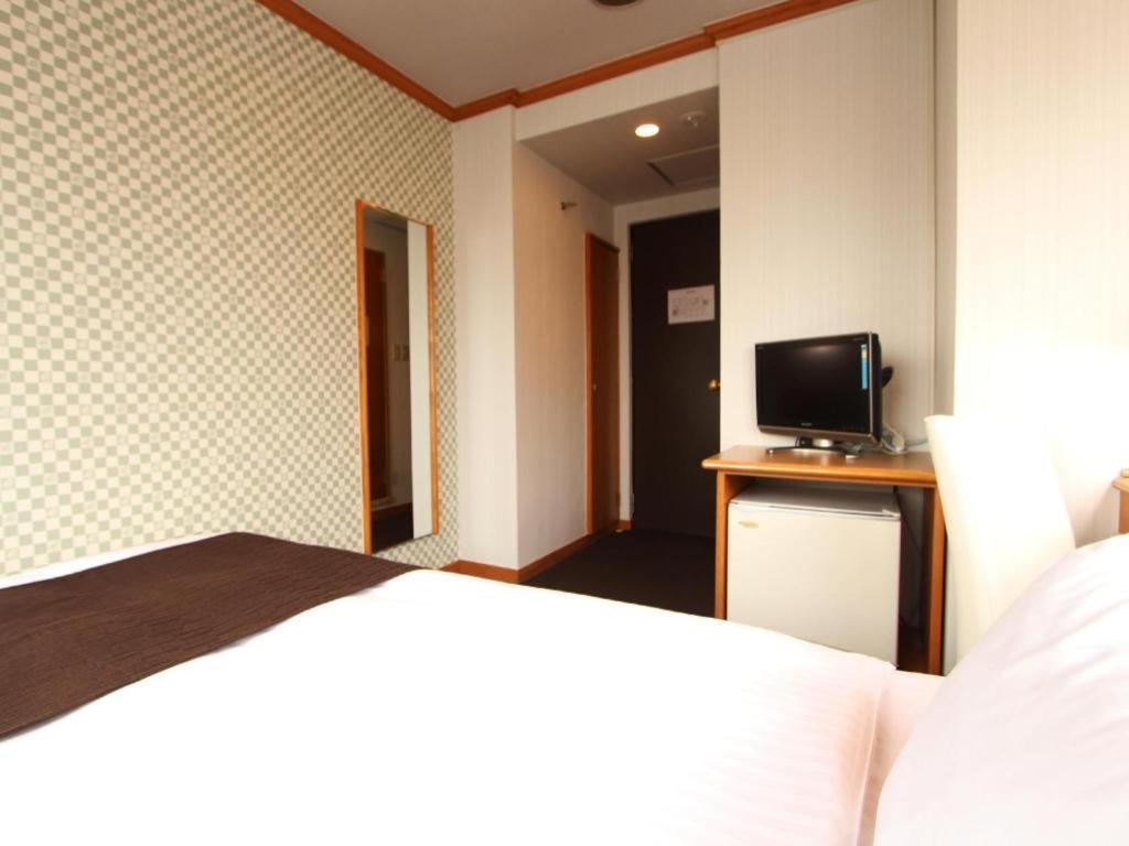 Hotel Livemax Budget Naha Tomarikou Exteriör bild