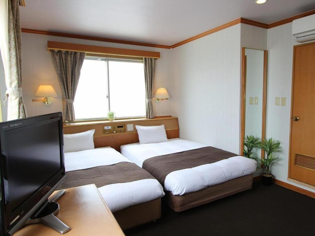 Hotel Livemax Budget Naha Tomarikou Exteriör bild
